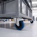 100mm blue non-marking rubber braked swivel castor on a mobile industrial storage rack