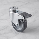 100mm braked swivel bolt hole castor grey rubber wheel 80kg on grey marble