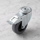 100mm braked swivel castor with grey rubber on polypropylene wheel, top view of the 12mm bolt hole and foot brake