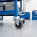 100mm braked grey rubber castors on a blue steel workshop trolley