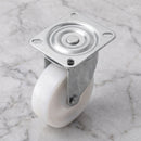 100mm swivel castor with white nylon wheel, top plate seen from above with solid centre cap