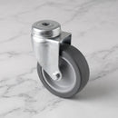 100mm swivel bolt hole castor grey rubber on polypropylene wheel 80kg on grey marble