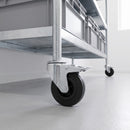 125mm black rubber braked bolt hole castors on a galvanised steel shelving unit
