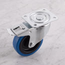 160mm braked swivel top plate castor blue non-marking rubber wheel 300kg on grey marble