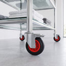 160mm black rubber braked bolt hole castor fitted to a chrome retail display unit