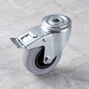 160mm braked swivel castor with grey rubber on polypropylene wheel and roller bearing, top view of the 12mm bolt hole