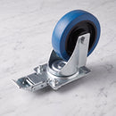 160mm directional lock castor with blue non-marking rubber wheel shown upside down on grey marble