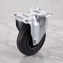160mm fixed top plate castor black rubber wheel 150kg, top view on grey marble
