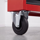 160mm fixed castor with black rubber wheel bolted under a red steel tool cabinet