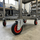 160mm swivel bolt hole castor with black rubber wheel, red centre and roller bearing, 135kg load capacity