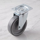160mm swivel top plate castor grey TPR wheel 200kg, top view on grey marble