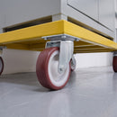 160mm swivel castor with red polyurethane wheel under a yellow steel machine moving frame