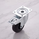 200mm braked swivel top plate castor black rubber wheel 200kg, high angle top-down view on grey marble