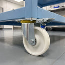 200mm directional lock castor white nylon wheel bolted under a light blue hospital equipment trolley