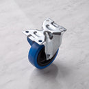 200mm fixed top plate castor blue non-marking rubber wheel 400kg, high angle view on grey marble