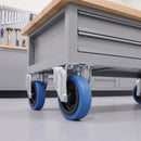 200mm fixed top plate castors with blue non-marking rubber wheels under a mobile workbench
