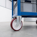 200mm red polyurethane swivel castors on a blue steel warehouse trolley