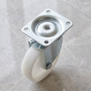 200mm swivel castor with white nylon wheel, top plate seen from above with hex socket centre