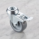 50mm braked swivel bolt hole castor M8 with grey rubber wheel on light grey marble, high-angle three-quarter view