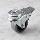 50mm braked swivel bolt hole castor with grey rubber tyre on black polypropylene centre on light grey marble, high-angle three-quarter view