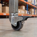 50mm braked grey rubber bolt hole castor fitted to a warehouse picking trolley