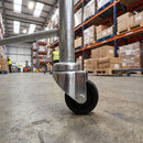 50mm swivel castor with black plastic wheel fitted to a warehouse trolley