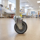 50mm grey rubber bolt hole castor fitted to a medical trolley tube leg