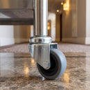 50mm grey rubber bolt hole castor fitted to a hotel serving trolley