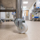 50mm white nylon swivel castor fitted to a medical trolley