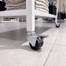 50mm twin wheel braked bolt hole castor with black wheels fitted to a retail clothing trolley leg