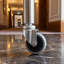 60mm swivel bolt hole castor with grey rubber wheel fitted to a hotel room service trolley