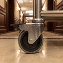 75mm braked swivel castor with grey rubber wheel fitted to a hotel trolley