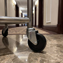 75mm black polypropylene bolt hole castor fitted to a hotel room service trolley