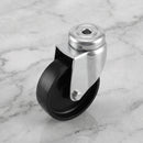 75mm swivel bolt hole castor with black polypropylene wheel on light grey marble, high-angle three-quarter view