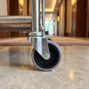 75mm grey rubber bolt hole castor fitted to a hotel serving trolley