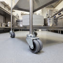 75mm twin wheel grey rubber bolt hole swivel castor fitted to a stainless steel catering trolley leg