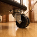 75mm twin wheel top plate castor bolted under a hotel room service trolley