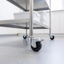 80mm black rubber braked bolt hole castors on a stainless steel lab cart