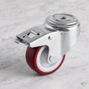 80mm braked swivel castor with red polyurethane wheel, top view of the 12mm bolt hole and foot brake