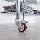 80mm braked red polyurethane castor fitted to a chrome steel retail display unit