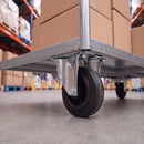 80mm fixed castor bolted under a galvanised warehouse platform trolley loaded with boxes