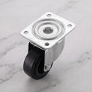 80mm swivel top plate castor black rubber wheel 70kg, top view on grey marble