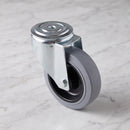 80mm swivel castor with grey rubber on polypropylene wheel, top view of the 12mm bolt hole