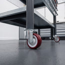 80mm red polyurethane swivel castor fitted to a steel mobile workbench leg