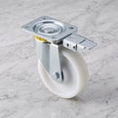 Directional lock swivel castor with white nylon wheel, lock pedal and zinc plated top plate