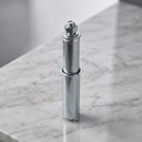 25.4mm round spring fitting castor adaptor in zinc-plated steel on light grey marble, high-angle three-quarter view