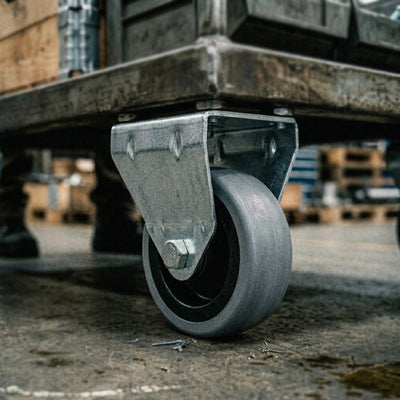 Black Pressed Steel Fixed Castors With Grey Rubber on Black Polypropylene Wheel - 50mm to 100mm